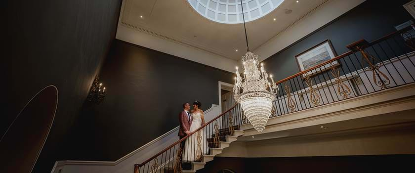 Kate and Sam on the Staircase of Rudding House