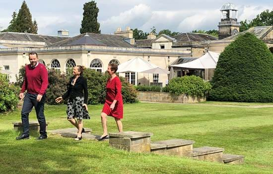 Marketing Team Walking in Rudding Park Grounds