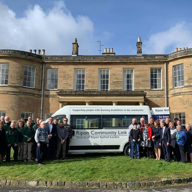 Taking delivery of the new mini bus, made possibly by fundraising 